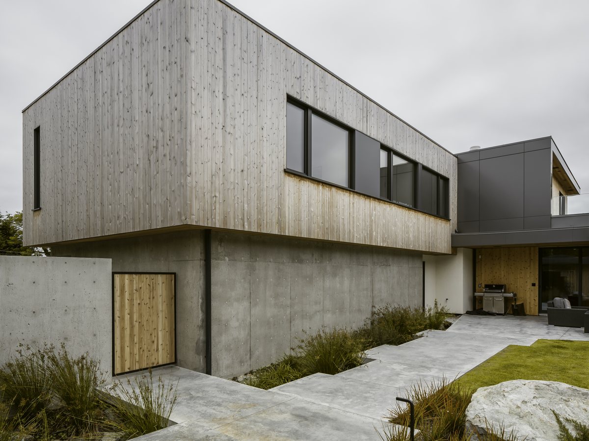 Concrete and timber facade at a coastal residence