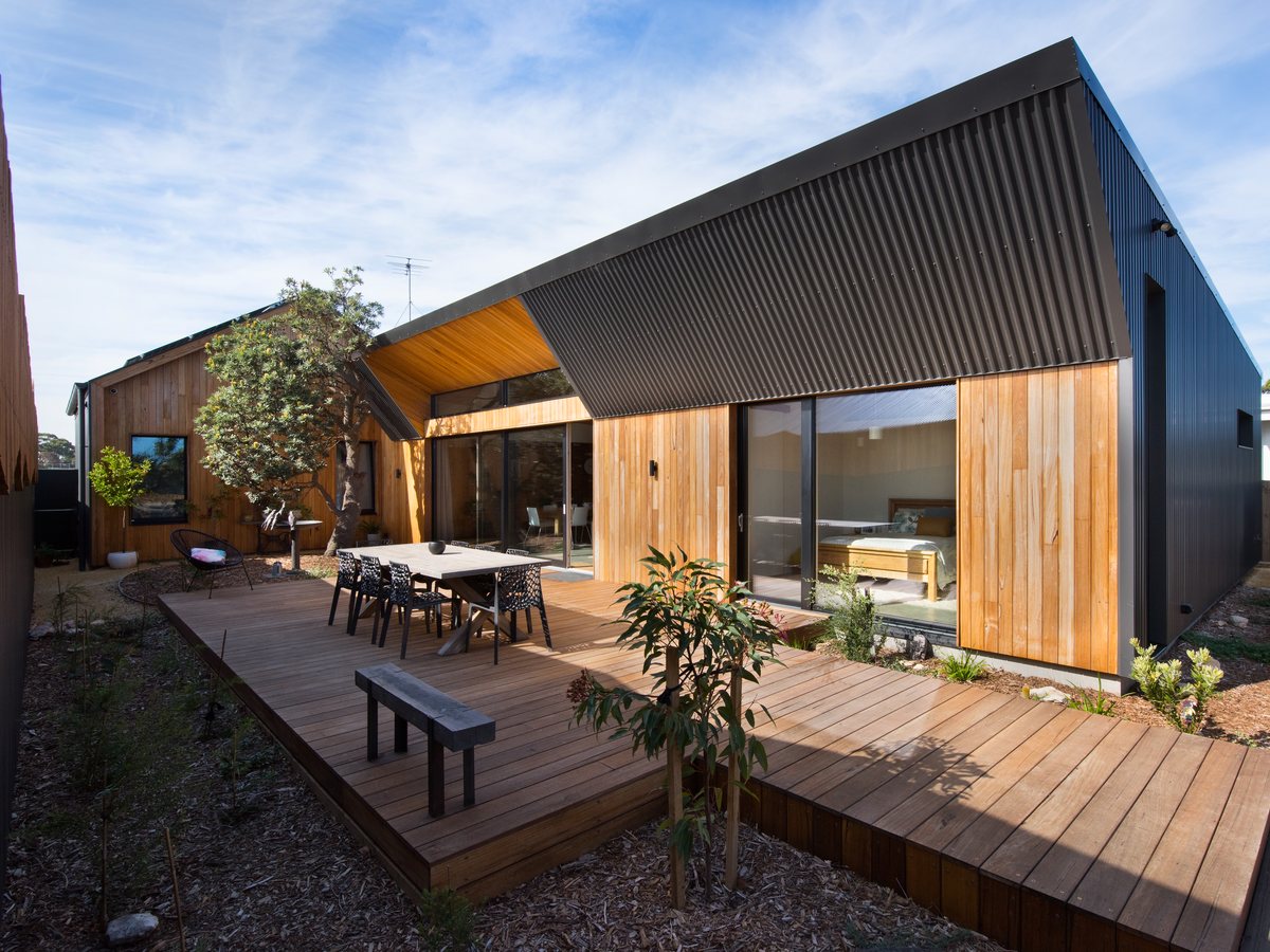 Lift-and-slide doors opening to a timber terrace