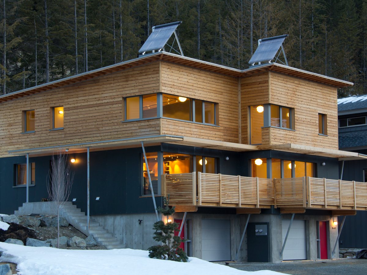 Passive House in snowy evening light