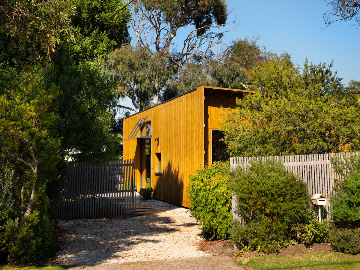 Residential timber facade with solar protection